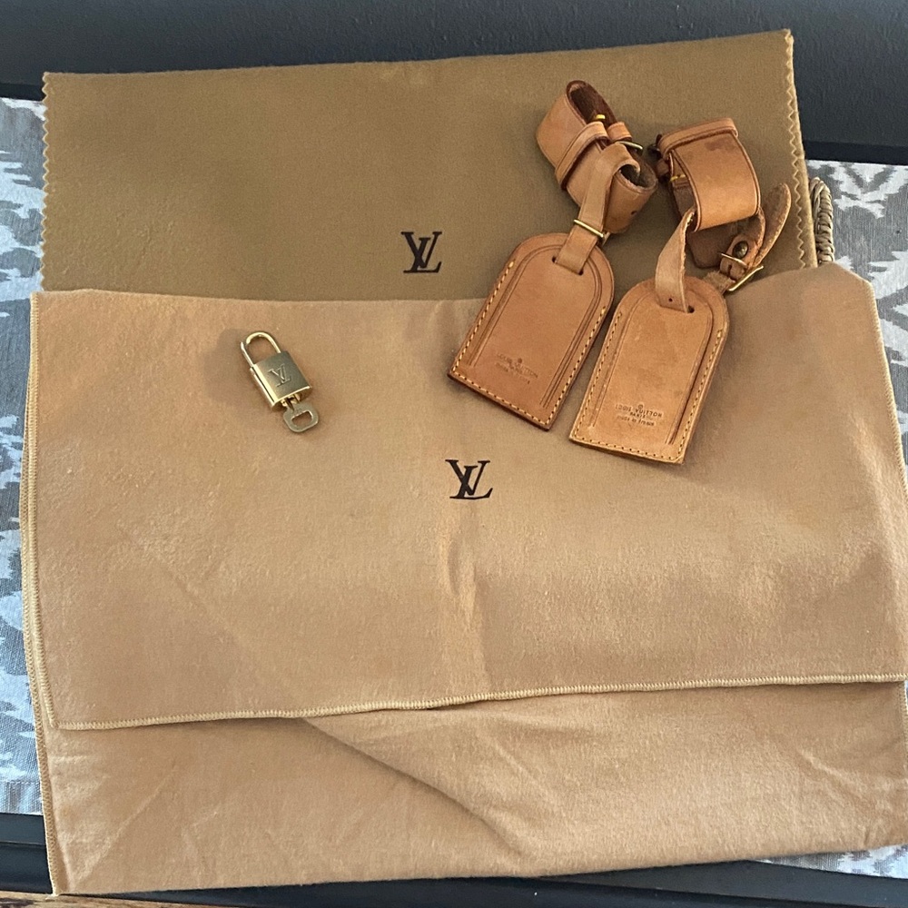 Louis Vuitton Set Includes: 2 Dust Bags, 2 Luggage Tags and Lock & Key #323